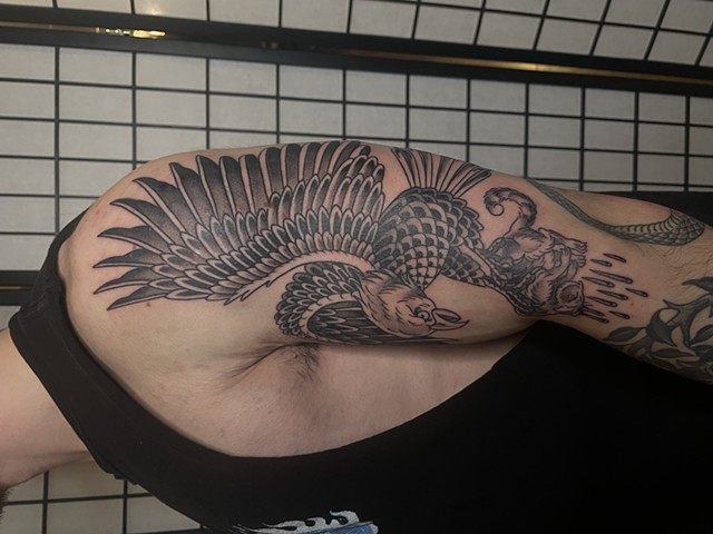 Eagle with squirrel tattoo by Alecia Thomasson