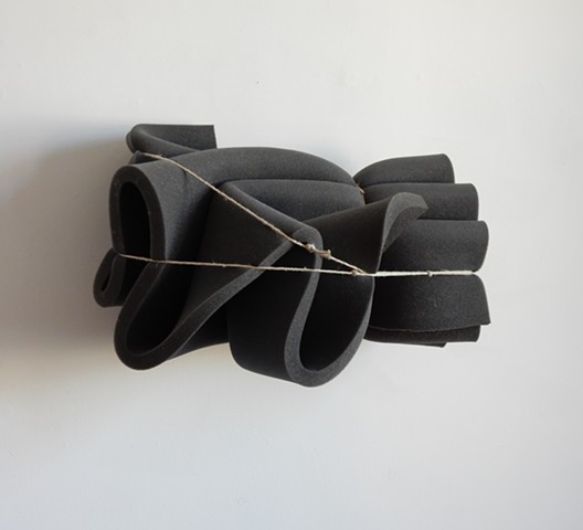 Contemporary, post minimalist, sculpture, wall hung, made of hi-density, closed cell foam and string. Robert Fields, 2018.