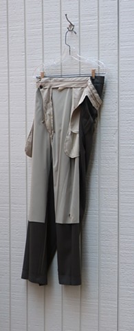  Contemporary conceptual sculpture. Robert Fields, "Untitled," 2020. 52 H x 19 W x 5 D inches. De-constructed men's trousers of wool and other fibers, Pres. Grant’s portrait on paper, with a pair of safety pins… all on hanger and hook.
