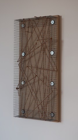 Robert Fields, "Papers please?" 2019. Galvanized steel wire screening with copper, steel and rubber fasteners, jute twine, and acrylic paint on wood panel. 30 H x 14 W x 4-1/2 D Inches. Contemporary, sculpture in a minimalist manner. 