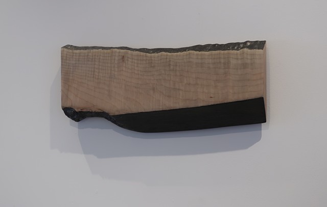 Robert Fields, "Me too." 2019. Graphite over acrylic paint on waxed maple. 9 H x 21-1/2 W x 1-5/8 D Inches.Contemporary, low relief, wall sculpture. 