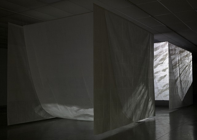 installation wax paper water video projection