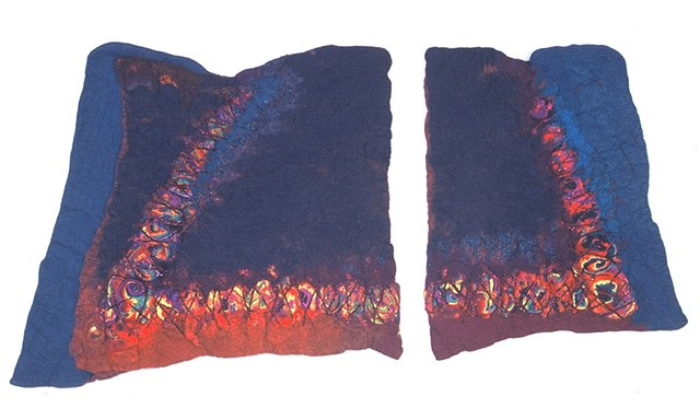 handmade felt wall piece made of dyed, unspun wool and yarns, by Sharron Parker. An abstract inspired by the volcanic forces which create geodes underground.
