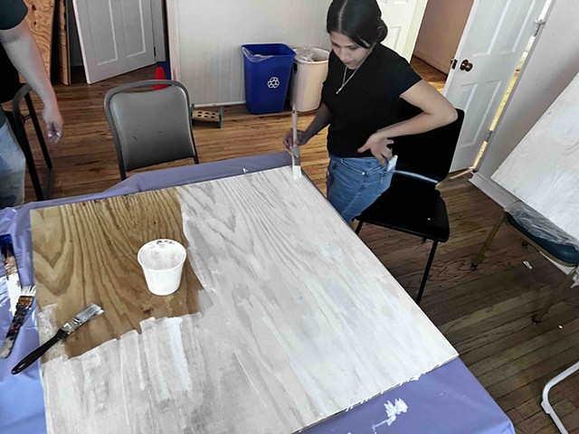 Priming wooden panels before drawing