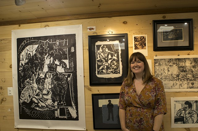 Catherine Cole and some of her work on view at the Friends of Studio 797 exhibit
