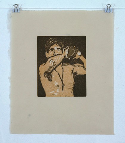 Jesse Football Reductive Linocut October 2013. by Catherine Cole. Brown, orange, yellow, football, male, male nude, shirtless male, shirtless man, cross, cross necklace, elbow, toss, throw, pose, brown hair, art, artwork, artist, print, printmaking, print