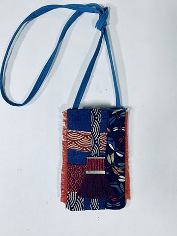 Cross-body, hand embroidered