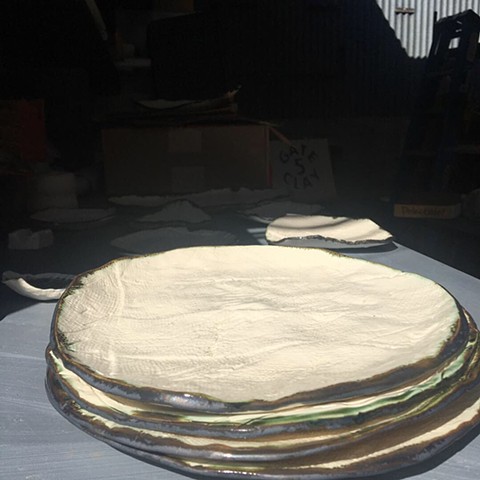 9" porcelain plates with bronze edge