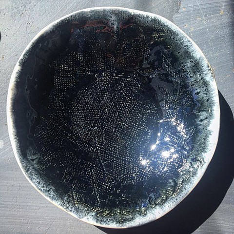 Blackened steel glaze on porcelain