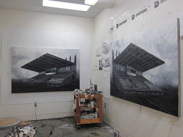 studio shot with stadium paintings in process 