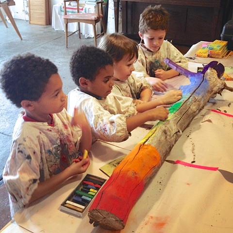 Children making chalk art, art classes for kids