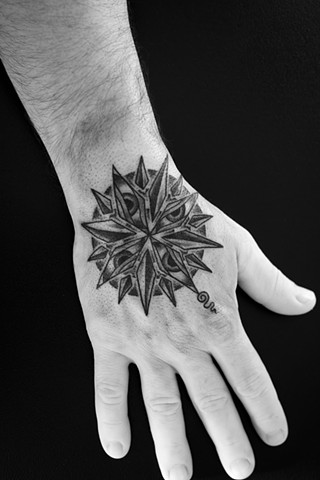 Tattoo by Mikel - Kelowna B.C. Canada. Compass of compassion