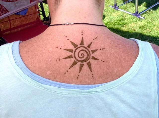 Henna sun on back
