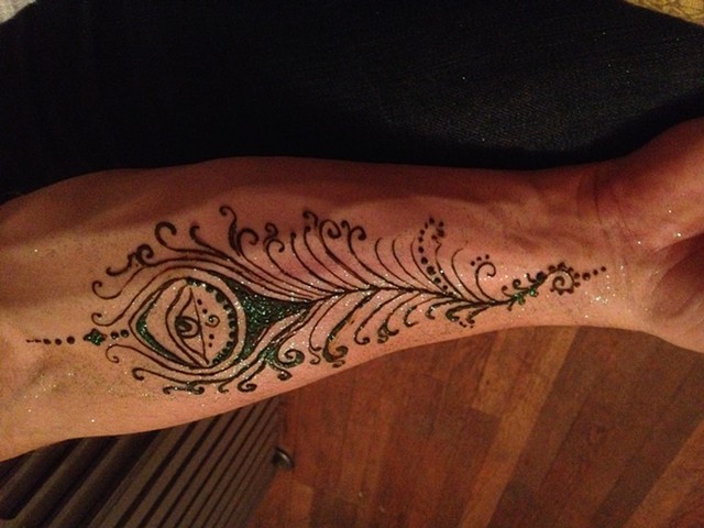 Henna on mans forearm