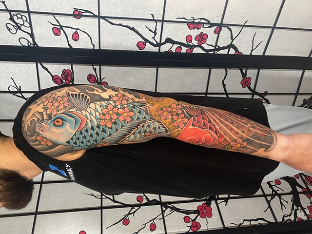 Best tattoo shop Phoenix Arizona Japanese tattoo design koi fish sleeve