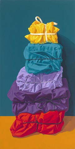 "Tall Stack" by Pamela Sienna, 24" x 12" oil painting still life of cloth, tied and stacked, bright color, contemporary realism