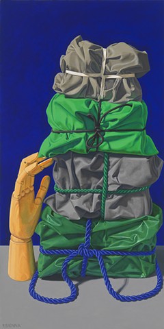 "Touch" by Pamela Sienna, 24" x 12"  oil painting, still life of cloth tied by cord and stacked with wooden hand, contemporary realism