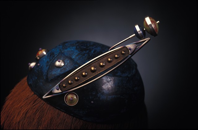 Copper, hollow formed hat with removable silver and enamel brooch