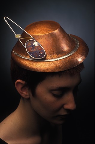 copper, hollow formed hat with removable silver and enamel brooch