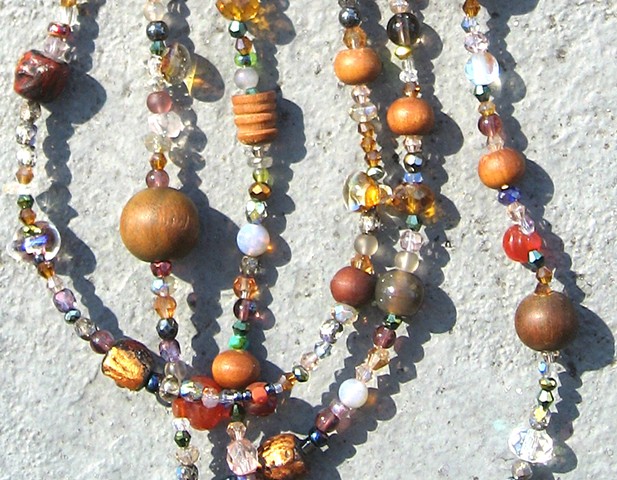Detail, Buddha beads harmony in orange