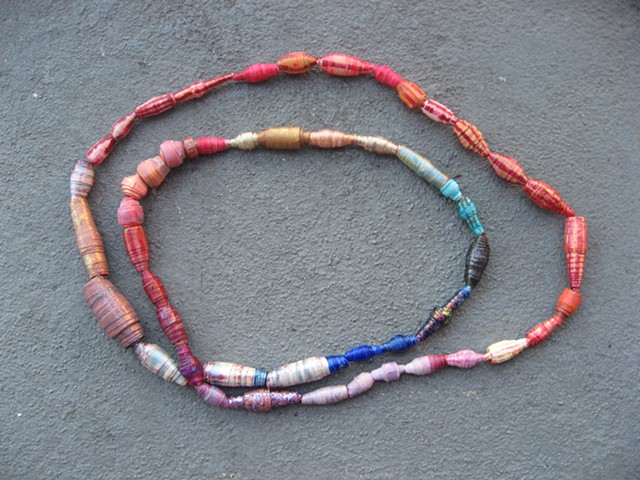 Handmade paper beads, magenta stripes (detail)