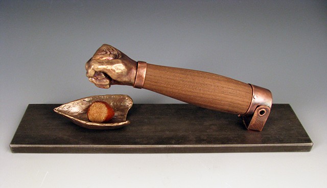 nutcracker, bronze copper steel walnut, lost wax casting, fabrication