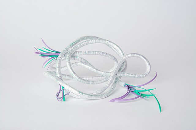 abstract plastic basket in lavender and mint by Jose Santiago Perez