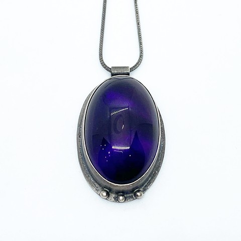 Amethyst and sterling silver pendant on sterling silver chain