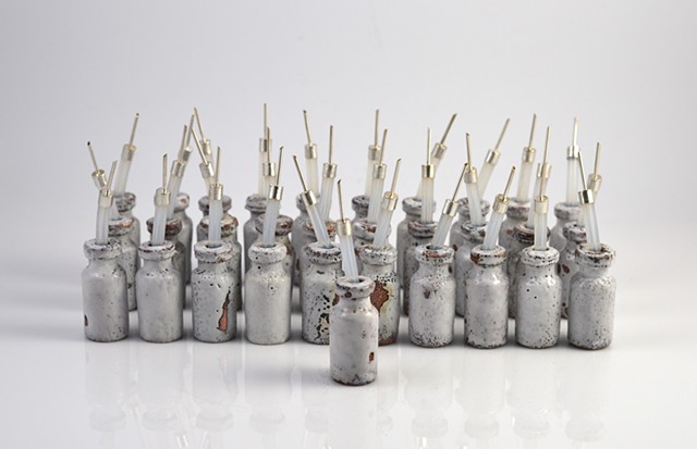 31 Enameled copper bottles with sterling silver caps by Erin Rice