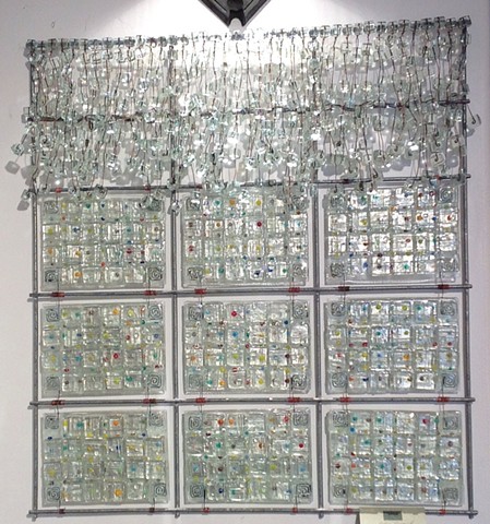 fused glass panels arranged in a 26"x24" grid