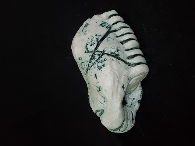 a piece of ceramics with two openings, in general a monolithic piece with the use of a mold