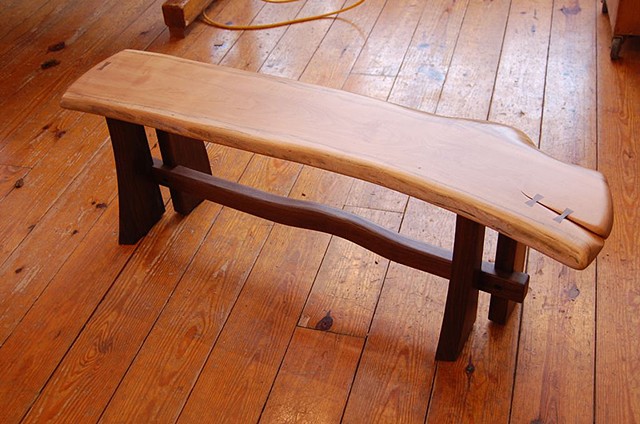 4 legged Sloop Bench
Elm top and walnut base

available 54 to 72 inches long, assorted hardwoods on walnut and cherry bases

