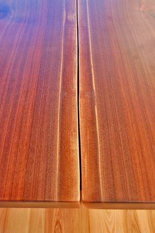 Detail - Walnut Trestle Table top. Book matched walnut slabs.