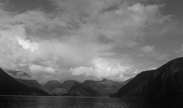 B&W photo of Nordic Fjord with clouds