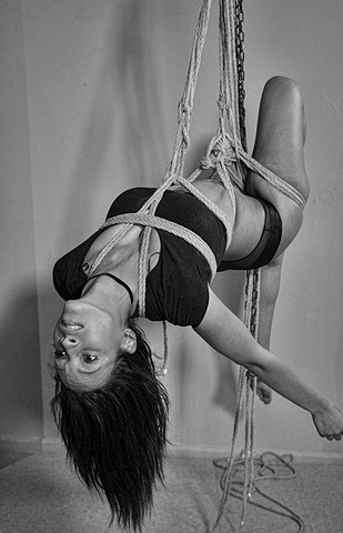 beautiful Indian woman suspended with long hair by rope photographed by la Mouge Photo