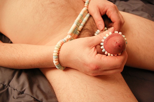 naked man masturbating restrained with candy restraints by la mouge erotic photo
