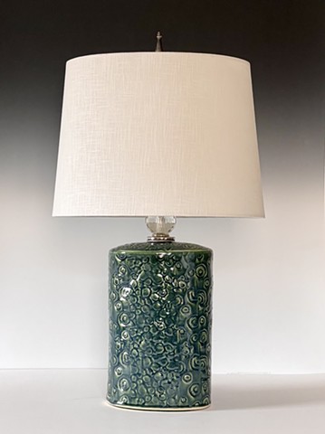 a beautiful green glaze and the oversized crystal gives this lamp its name.