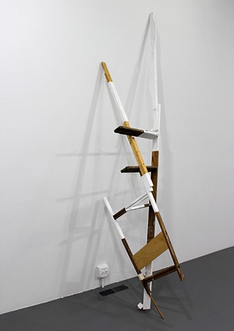 sculpture created with found ladder, paint, gesso, wood; title is Get Over It