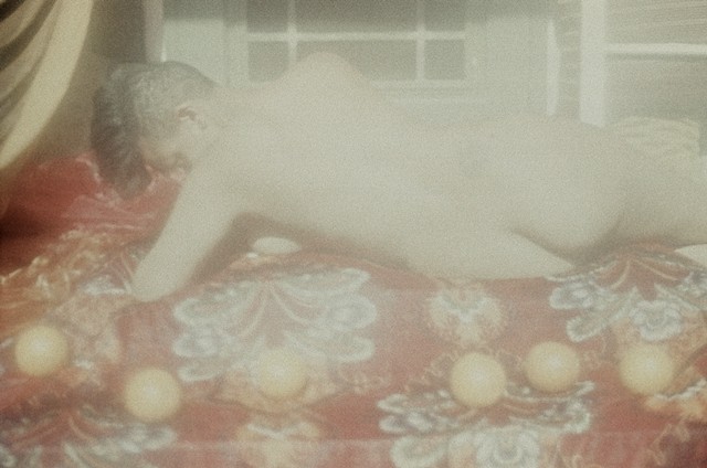 Reclining nude with oranges