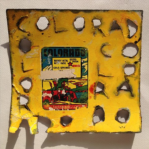 Yellow mixed media artwork on rag paper titled Colorado, one block in a State Quilt series of a large art installation