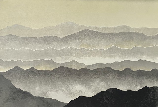 mountain range, mist rising in foreground, muted tones
