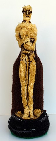 Oscar academy award wine bottle cozy crochet wine cozy yarn fiber art by Pat Ahern.