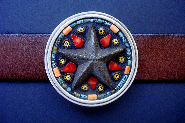 One of a kind belt buckle with a rusty iron star, coral and millefiori, jasper.