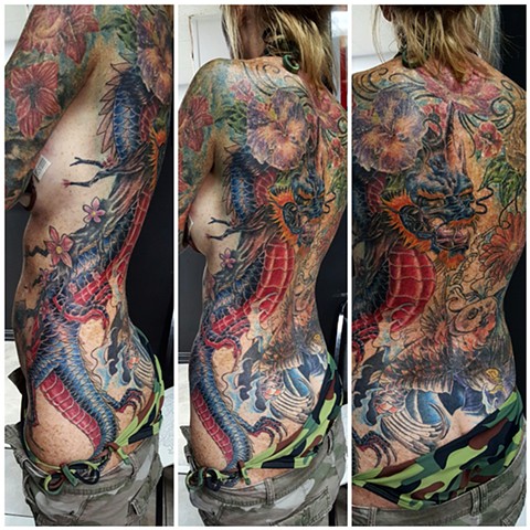 dragon tattoo. flower tattoo. koi tattoo. backpiece color tattoo