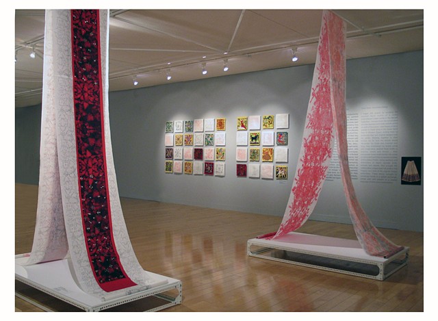 scroll installed at the Benaki Museum with images of red carnations