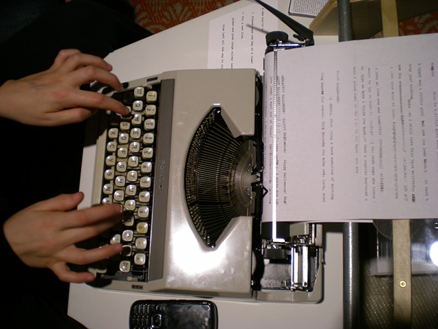 Typewriter; Kate's hands