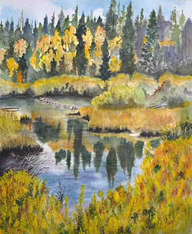 Pond and yellow aspens in Rocky Mountain