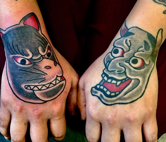Kitsune and Hannya 
Hand tattoos 