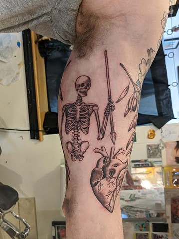 Heart and skeleton tattoo