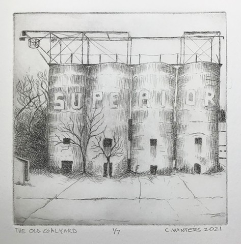 Small black and white print of abandoned coal towers. 